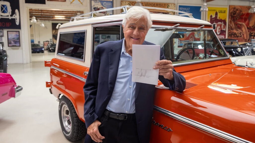 Jay Leno at his garage, where Governor Newsom signed California's new classic car smog exemption law (Photo credit: Government of California)