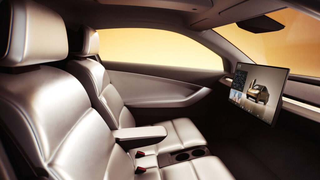 Tesla Cybercab autonomous robotaxi concept without steering wheel or pedals (Photo credit: Tesla)